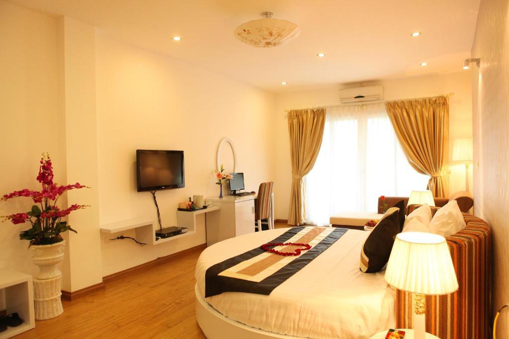 Splendid Star Suites Hotel Hanói Quarto foto
